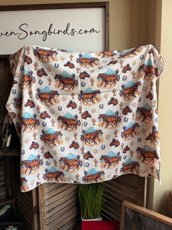 Wild Rag scarf folded display, white background with repeating horse and horseshoe icons