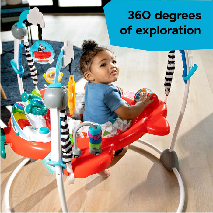 Baby enjoying the Baby Einstein Airplane Adventure 2-in-1 Activity Jumper with interactive toys and 360-degree rotating seat.
