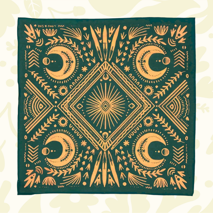 The Bandit Bandanas Stay Steady: square, cotton bandana with yellow moons, suns, plants—adventure style accessory for outdoors.