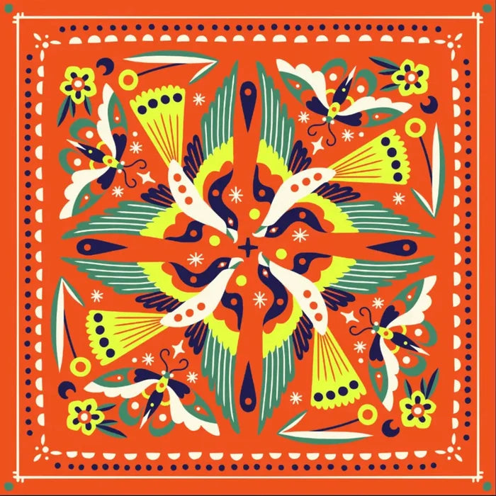 The image depicts the bandana design which features bright colours of orange, yellow, navy and jade with a reflected design of flowers, butterflies and swallows