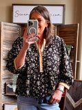 Black floral 3/4 sleeve blouse with button placket and gathered waist