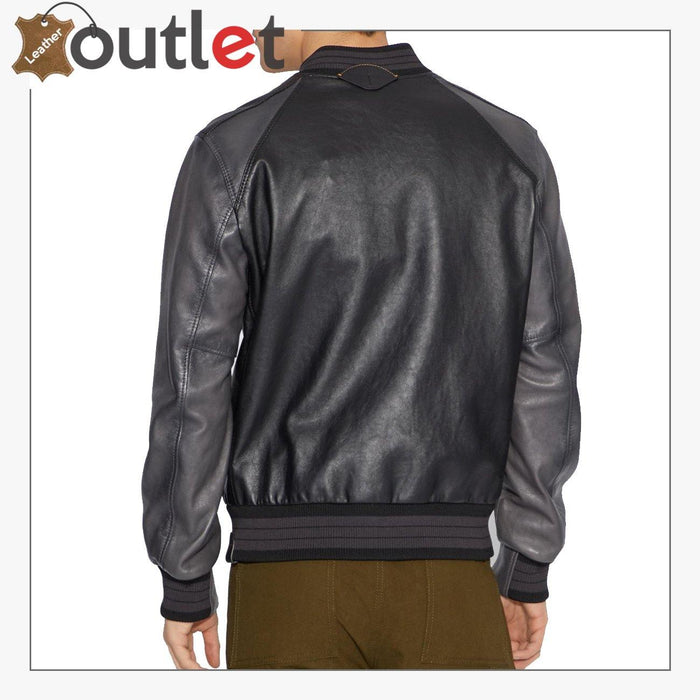 Back view of the all black leather varsity jacket showing straight body cut