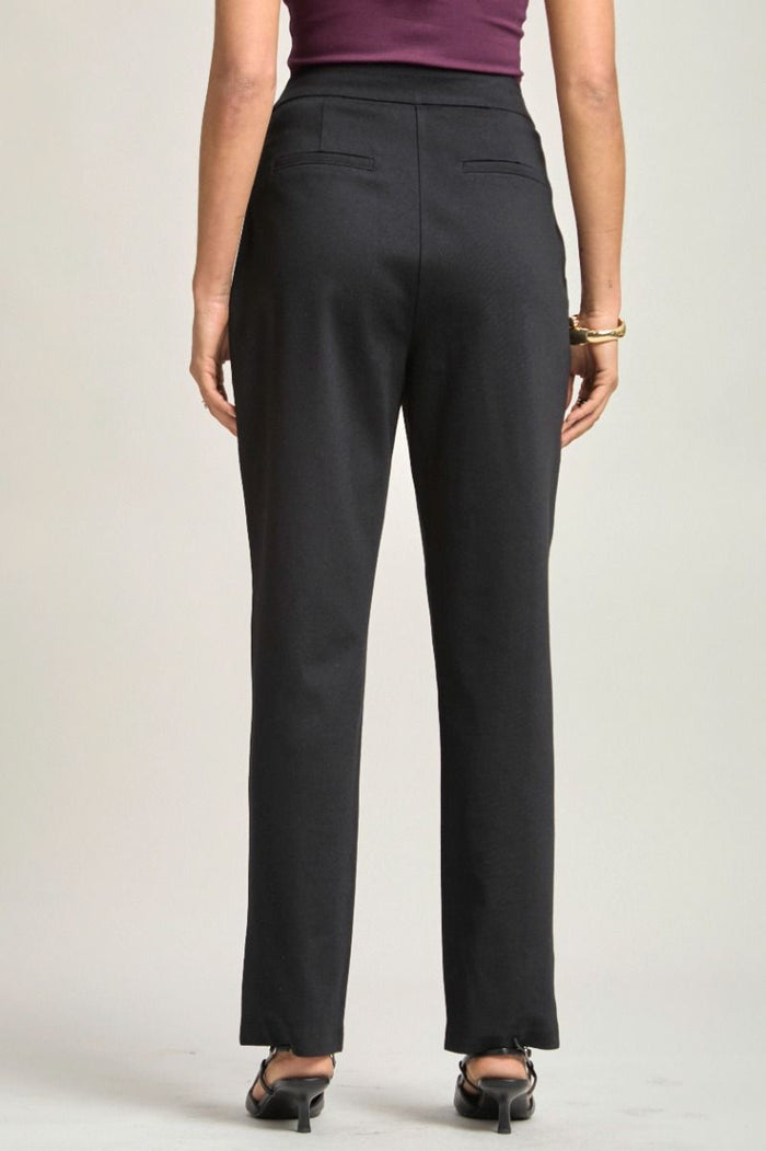 Black ponte pants back view with welt pockets and center-seam detail