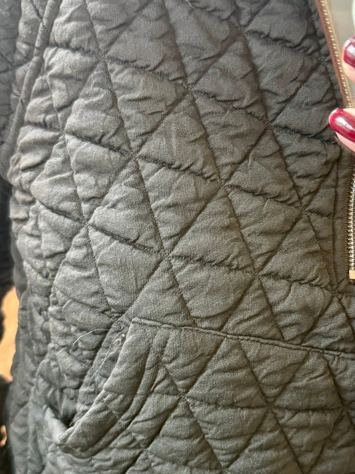 Dark quilted 1/4 zip sweatshirt fabric with raised stitched pattern