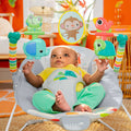 Bright Starts Playful Paradise vibrating baby bouncer with colorful spinning toys and soft seat