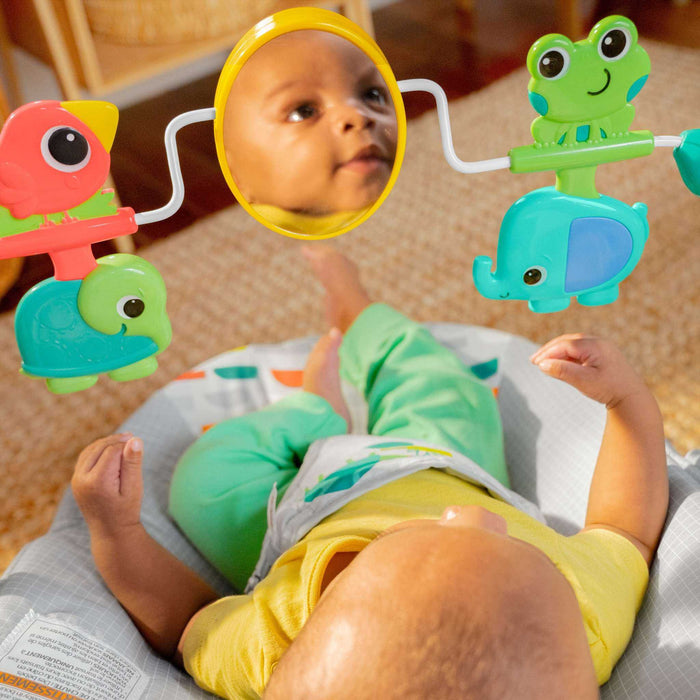 Bright Starts Playful Paradise vibrating baby bouncer with hanging tropical toys and baby-safe mirror