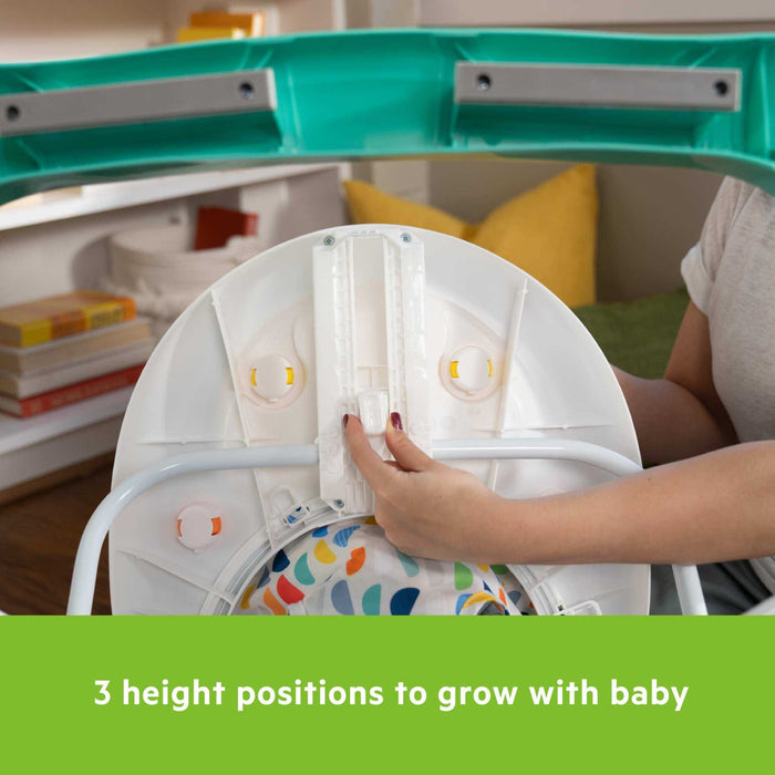 Bright Starts Ready to Roll multicolor baby walker with lights, sounds, and removable toy station.