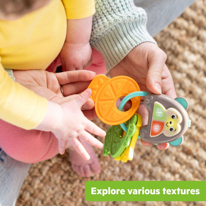 Bright Starts Safari Sounds Gift Set with colorful musical drum and textured monkey key toys for babies 3 months and up
