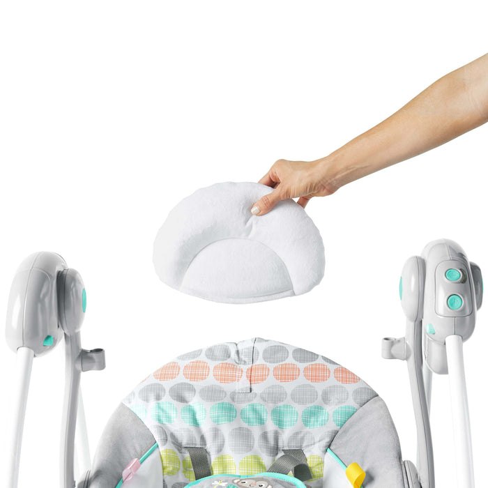 Whimsical Wild Portable Swing with removable head support pillow.