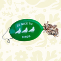 Forager Provisions LTD grass green rubber wallet with Be Nice To Birds text and bird icons, featuring a snap closure.