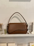 curve shoulder bag