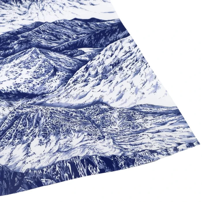 Eco-friendly navy mountain gift wrap by Discover & Draw on white paper—sustainable, stylish wrapping for any occasion.