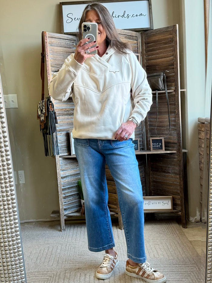 Cream hoodie sweatshirt with small chest logo and kangaroo pocket