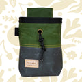 Fernweh UK Moss/Scree waxed canvas chalk bag, black trim, tan Fernweh label, drawstring closure—climbing gym essential.
