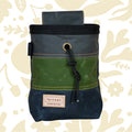 Fernweh UK waxed canvas chalk bag in Scree, Moss, Storm, with front logo patch & secure drawstring closure for climbers.