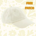 Forager Provisions beige dad cap Patch Your Cap! on floral background, FREE PATCH promo in vibrant text hat accessory.
