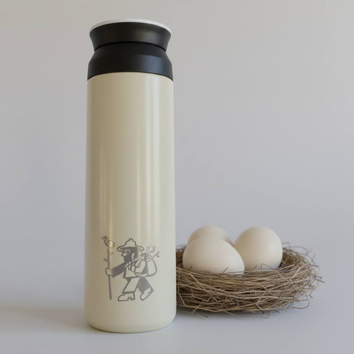 Forager Provisions Collard Dove Egg Travel Mug next to four eggs on plain background—perfect eco-friendly drinkware gift.