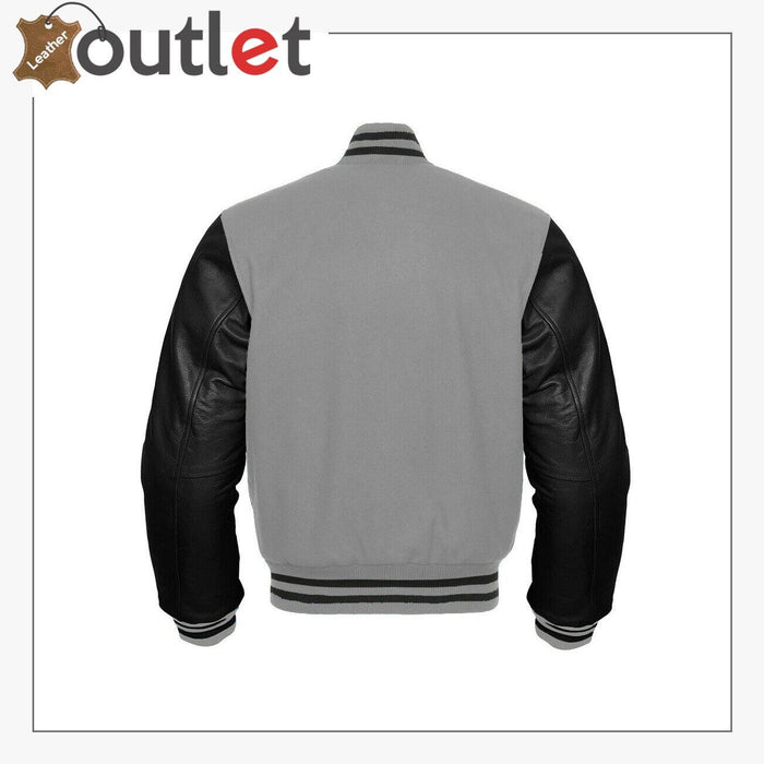 Side view of the grey and black varsity bomber showing leather sleeve and ribbed cuff