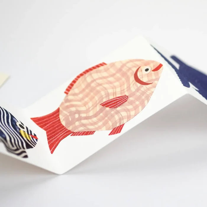 Shop Hadley Paper Goods Fish Concertina Greeting Card with pink-red fish design and eco-friendly recycled citrus paper envelope.
