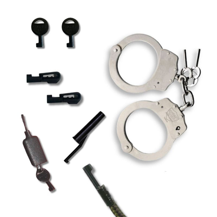 Set of handcuffs and keys on a white background