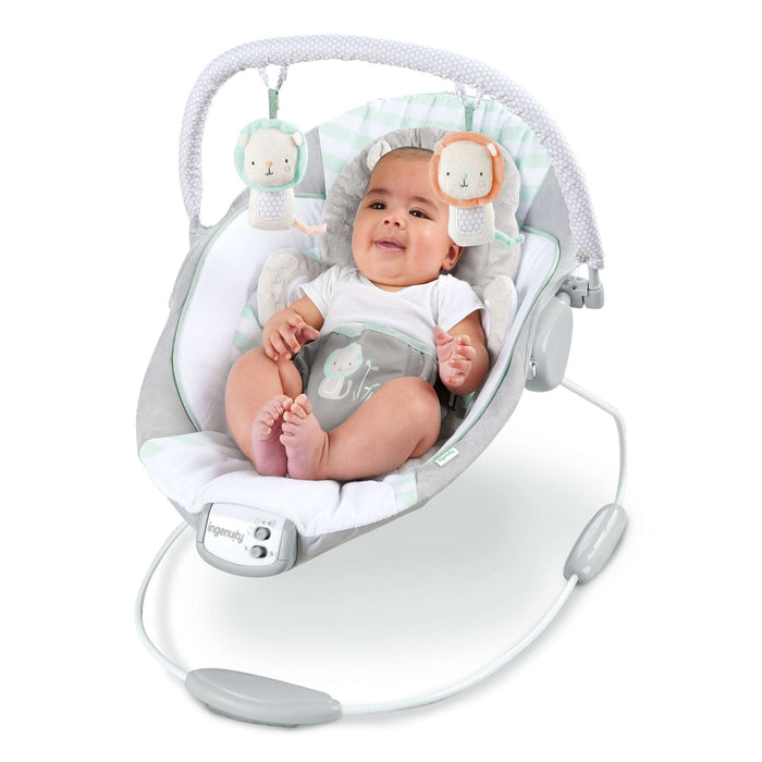 Ingenuity Bouncer infant seat with Landry the Lion plush, soothing vibrations, melodies, and removable toy bar