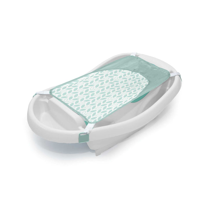 Ingenuity Comfy Clean Deluxe newborn to toddler baby bather with fabric sling, padded support, and parent tray