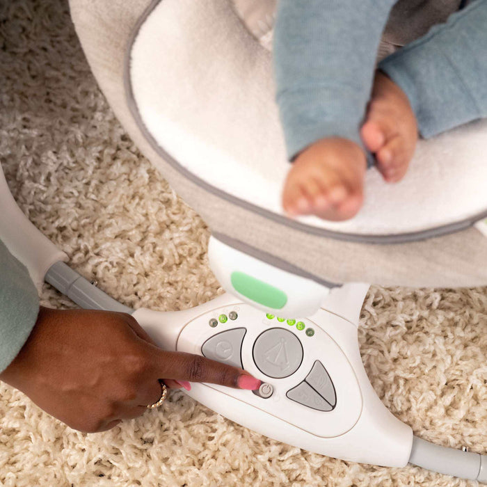 Ingenuity ConvertMe Swing-2-Seat Wynn with plush seat and pivoting toy bar for newborn comfort and soothing vibrations