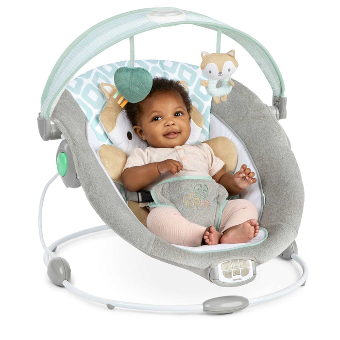 Ingenuity InLighten baby bouncer seat with light up toy bar and plush fox bolster