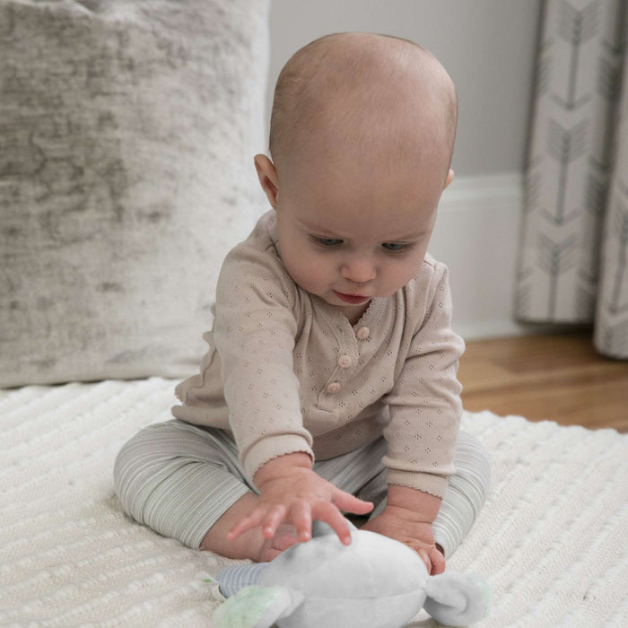 Ingenuity Premium Soft plush Van the Elephant ring rattle for infants, soft comforting fabric and gentle soothing sounds