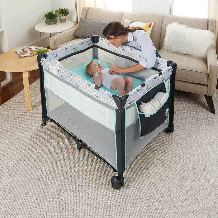 Ingenuity Smart and Simple Travel Cot with bassinet and changing table