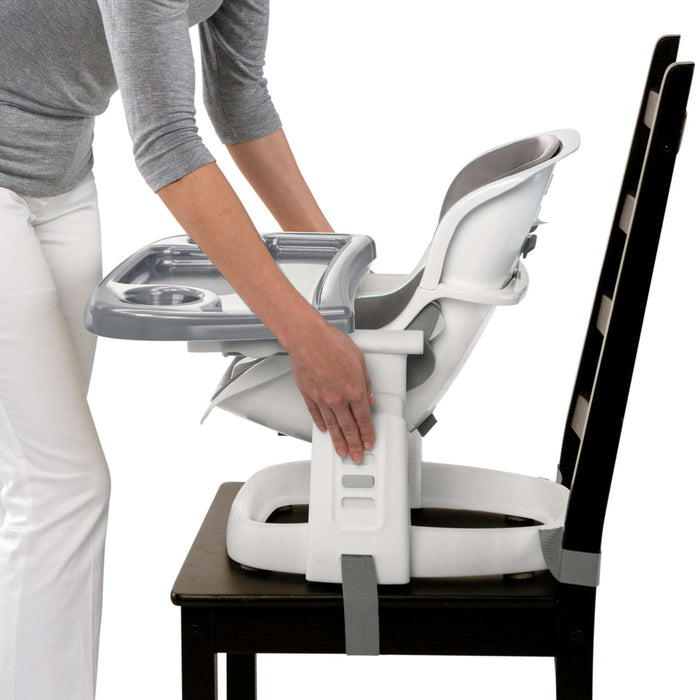Ingenuity SmartClean ChairMate high chair attached to dining chair with removable tray and 5-point safety straps in slate color