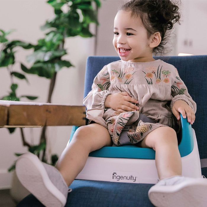 Ingenuity SmartClean Toddler Booster Seat in peacock blue with removable foam insert and 3-point harness
