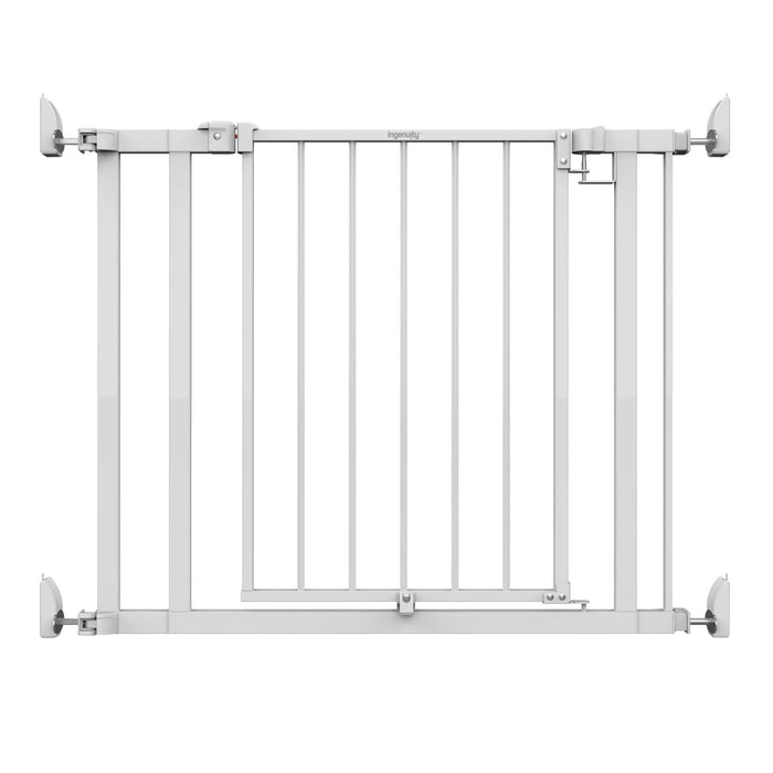 Ingenuity The Doorway 37W Series white metal pet and baby safety gate with Quad Cam-Lock system installed in doorway