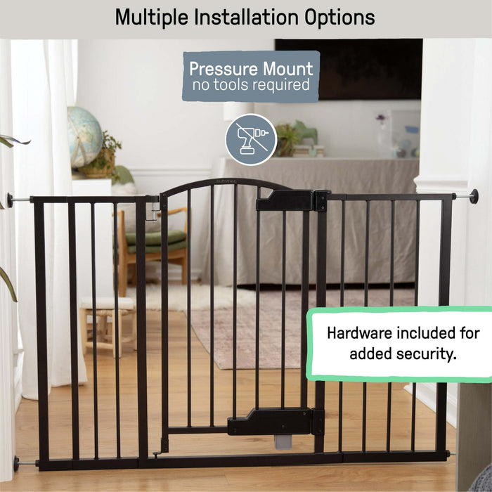 Ingenuity The Thruway 52W Series baby and pet gate with GlideOpen foot pedal and espresso metal finish installed in doorway