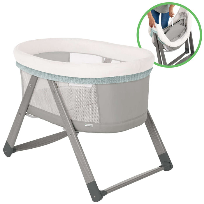 Ingenuity Wood FoldAway Rocking Bassinet with breathable fabric and foldable wooden frame for easy portability