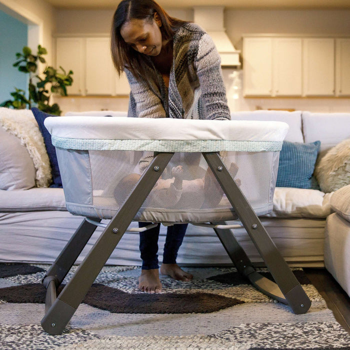 Ingenuity Wood FoldAway Rocking Bassinet with breathable fabric and foldable frame