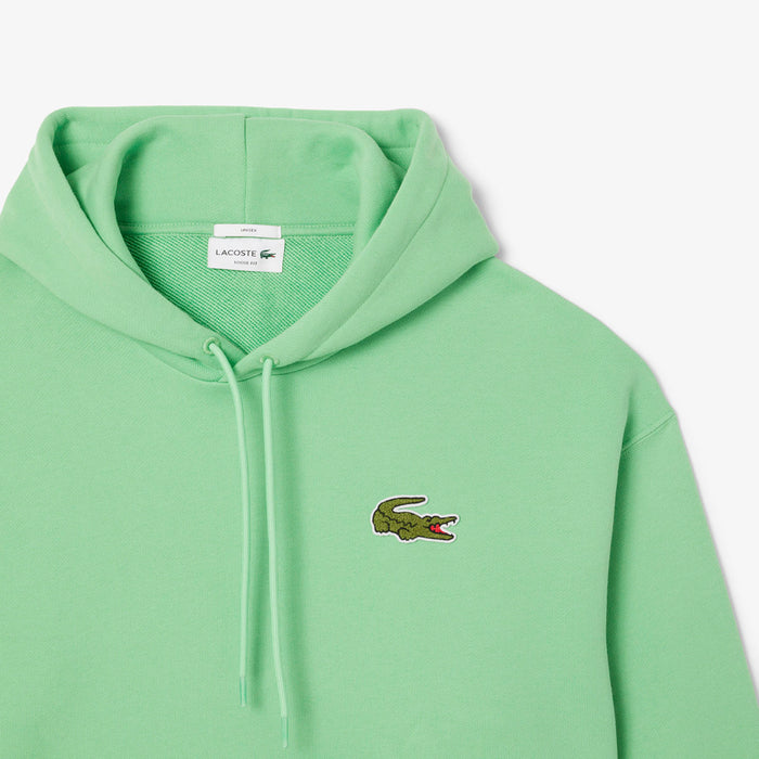Lacoste - Loose Fit Badge Accent Hoodie in Liamone Green - Nigel Clare