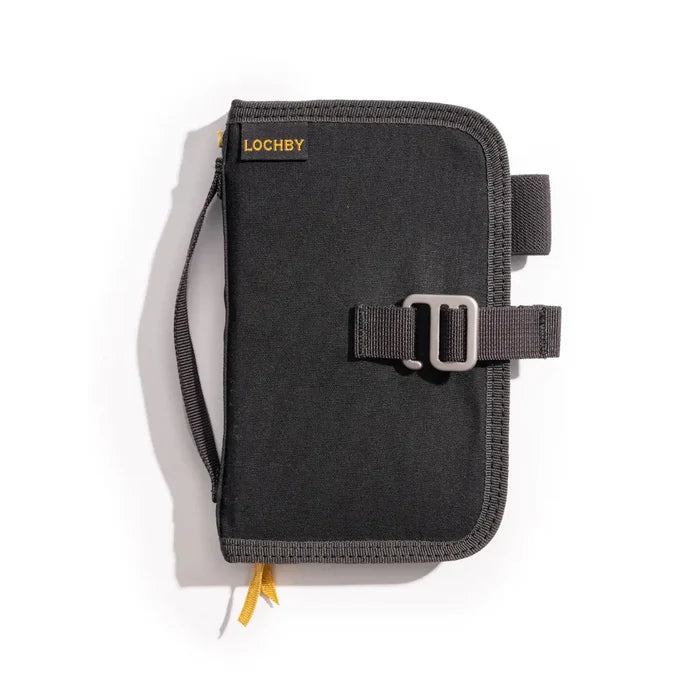 Closed Lochby Mini Field Journal Bumblebee Charcoal, handle, secure buckle strap, yellow logo top left, durable design.