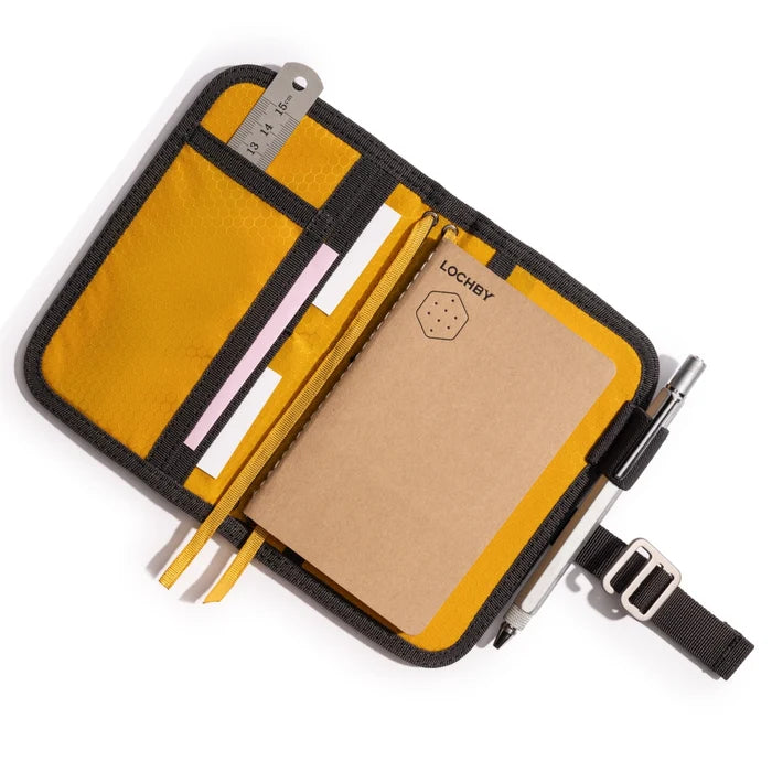 Lochby Mini Field Journal Bumblebee Charcoal: yellow zip case with pen, ruler, journal, and paper strips inside.