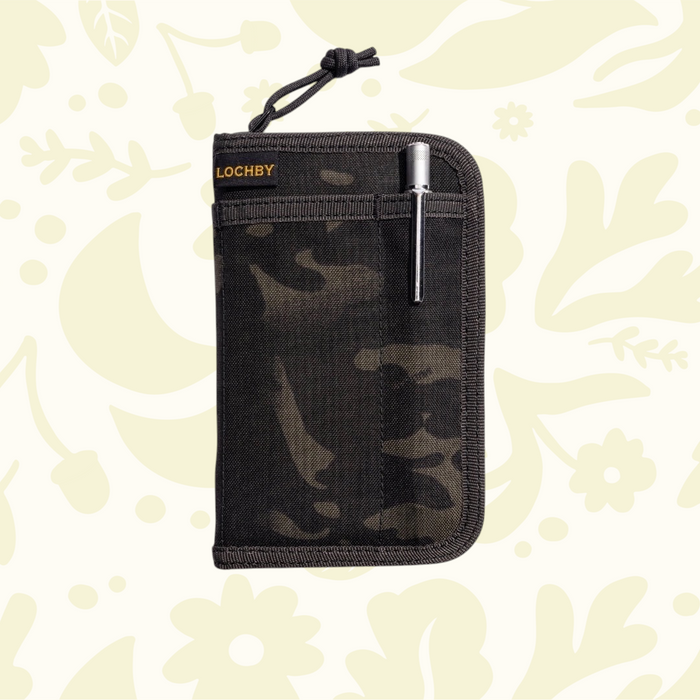 Forager Provisions LTD Lochby pocket journal in camo waxed canvas with an external pen loop and metal pen