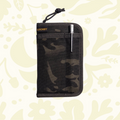 Forager Provisions LTD Lochby pocket journal in camo waxed canvas with an external pen loop and metal pen