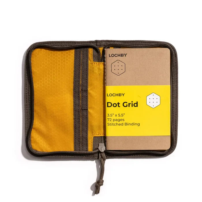 Lochby Pocket Journal Camo in yellow and brown waxed canvas cover, displayed on a white background, stylish and durable.
