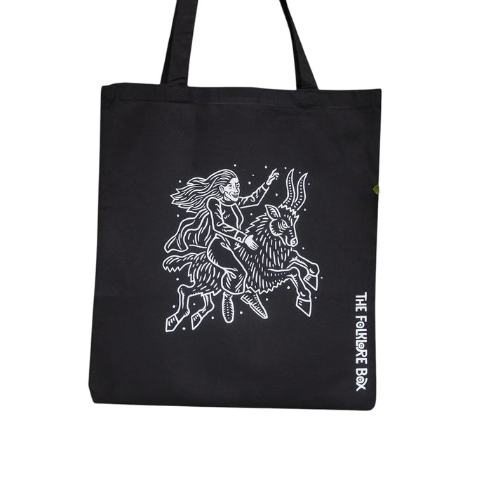 Forager Provisions LTD black cotton tote bag featuring a white Matt Willis witch riding a goat folklore illustration.