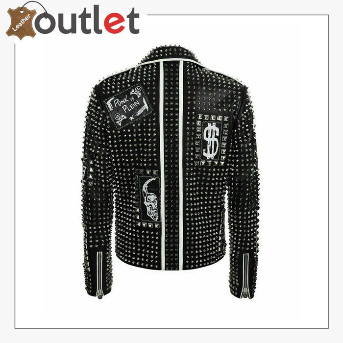 Back view of the studded punk jacket showing stitched patches and embroidered panel work