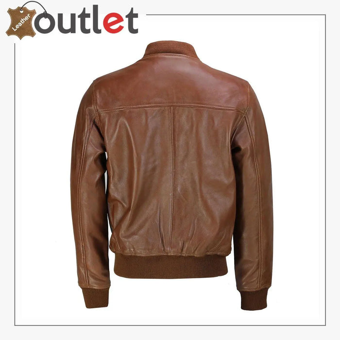 Side view of the tan leather casual jacket showing regular fit and soft drape
