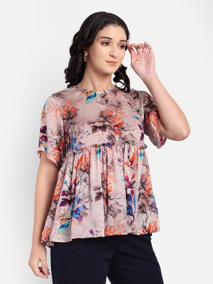 Women’s beige floral Millie top with peplum style, soft flowy fit and elegant stylish design