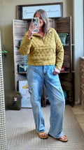 Mustard quilted 1/4 zip sweatshirt with textured diamond quilting and relaxed fit