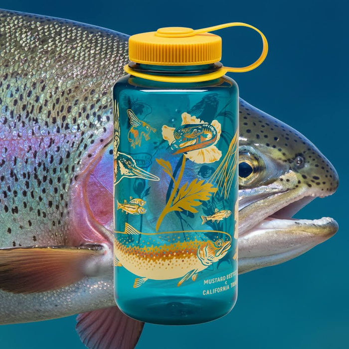 Mustard Beetle 32oz Nalgene bottle by Malibu Creek, designed for Cal Trout, sits before a large fish in clear water.