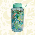 Forager Provisions LTD 32oz Nalgene water bottle in translucent grey with a vibrant hummingbird and floral print.