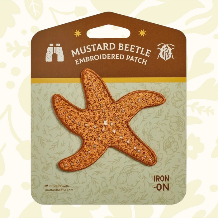 Forager Provisions LTD Mustard Beetle ochre starfish iron-on embroidered patch on branded display card.